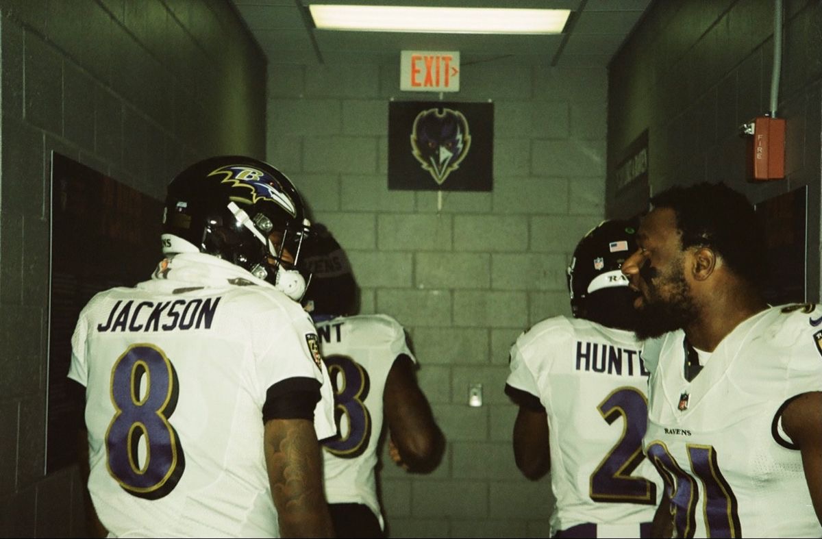 Lamar Jackson and Huntley in tunnel before game